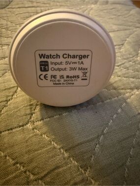 White Apple Watch Charger and 5 Apple Watch Bands Size 42/44